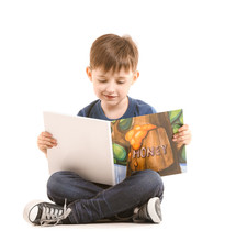 Cute Little Boy Reading Book On White Background