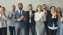 Diverse Business Colleagues Clapping Hands After Meeting