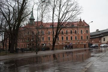 Wall Mural -  The most famous Polish Royal Cracow Wawel Castle on Christmas Day in rainy weather.