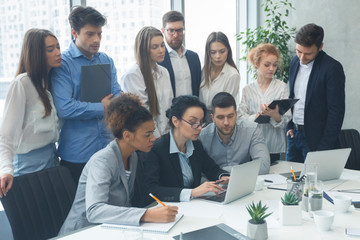 Aufkleber - Corporate businesspeople using laptop and checking results of work