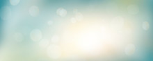 A fresh spring blue sunny sky background with blurred bokeh from the sun.