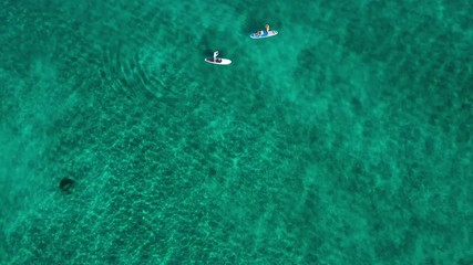 Wall Mural - aerial drone footage of seven mile beach, west bay and george town on the island of grand cayman in the cayman islands in the clear blue and green tropical waters of the caribbean sea