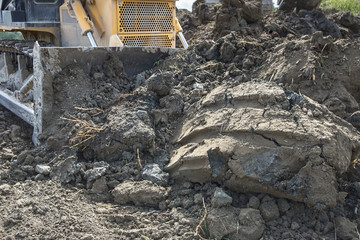 soil movement with a modern bulldozer in preparation for the construction site