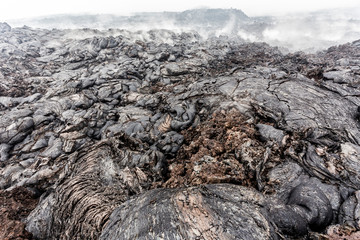 Canvas Print - Eruption of volcano, close up view of solidified lava, volcanic landscape, Kamchatka Peninsula, Russia