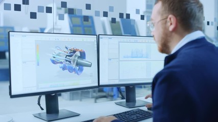 Poster - Industrial Engineer Working on a Personal Computer, Two Monitor Screens Show CAD Software with 3D Prototype of Hybrid Electric Engine and Charts. Working Modern Factory. Camera Zoom in on Display
