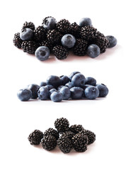 Wall Mural - Black and blue berries isolated on a white. Top view. Ripe blackberries and blueberries on white background. Berries with copy space for text. Background fruits. Blue and black food.