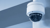 Fototapeta Do przedpokoju - A review of surveillance cameras on white background. Security concept. Facial recognition. Program search for criminals.