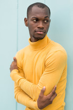 Man Wearing A Yellow Sweater