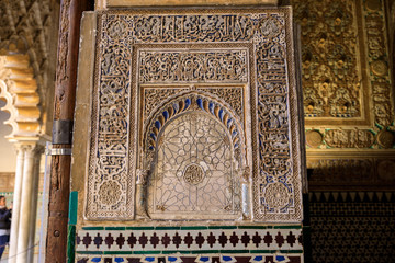 Seville / Spain; February 2019: Patterns on the wall in the Ambassador's Hall ('Sala de Embajadores') of the Royal Alcazars of Seville ('Real Alcazar de Sevilla')