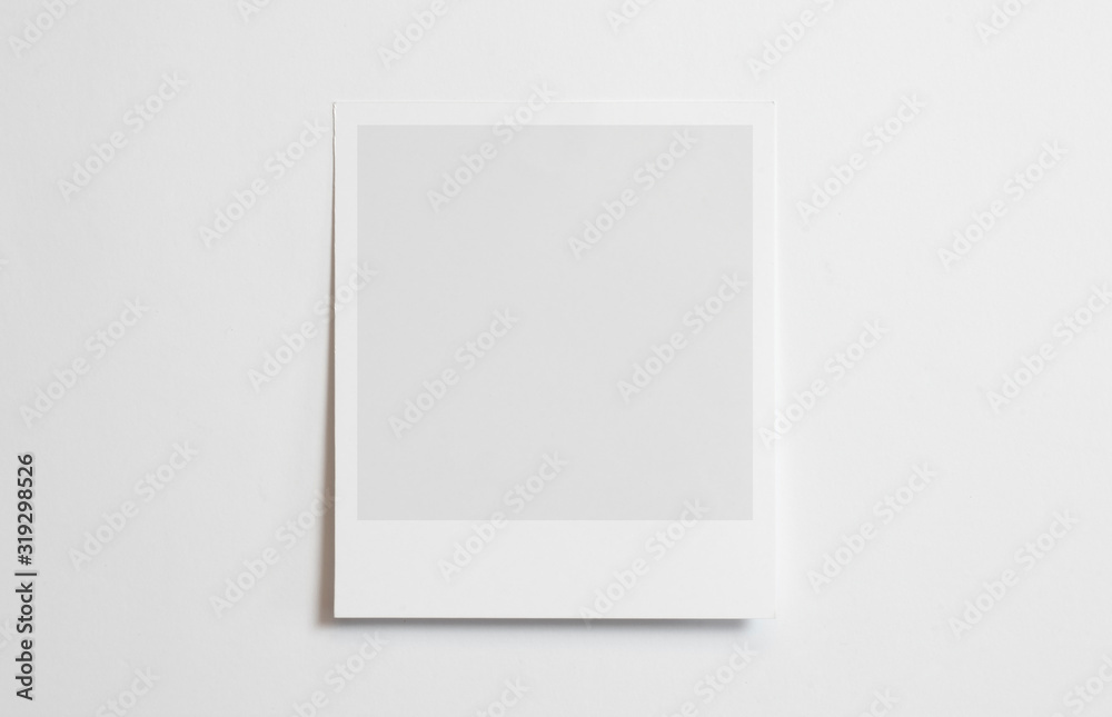 Blank polaroid photo frame with soft shadows tape isolated on white paper background as template for graphic designers presentations, portfolios etc. - obrazy, fototapety, plakaty 