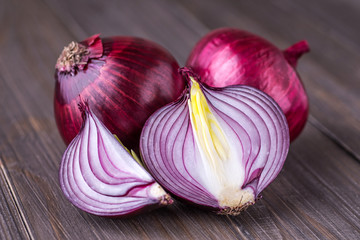 Wall Mural - red onions on rustic wood