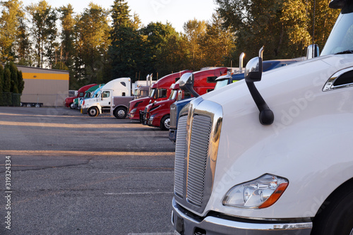 Truck stop. A row of trucks during a stopover, travel breaks. Tableau sur Toile