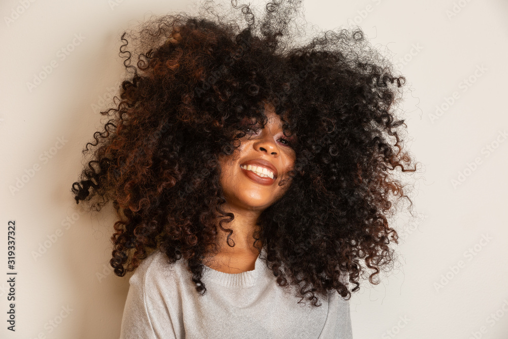 Beauty portrait of african american woman with afro hairstyle and glamour makeup. Brazilian woman. Mixed race. Curly hair. Hair style. White background. - obrazy, fototapety, plakaty 