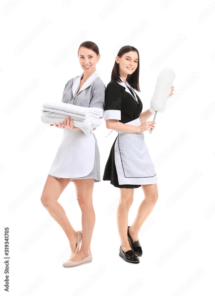 Portrait of beautiful chambermaids on white background