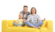 © Pixel-Shot - Happy young family with sofa on white background