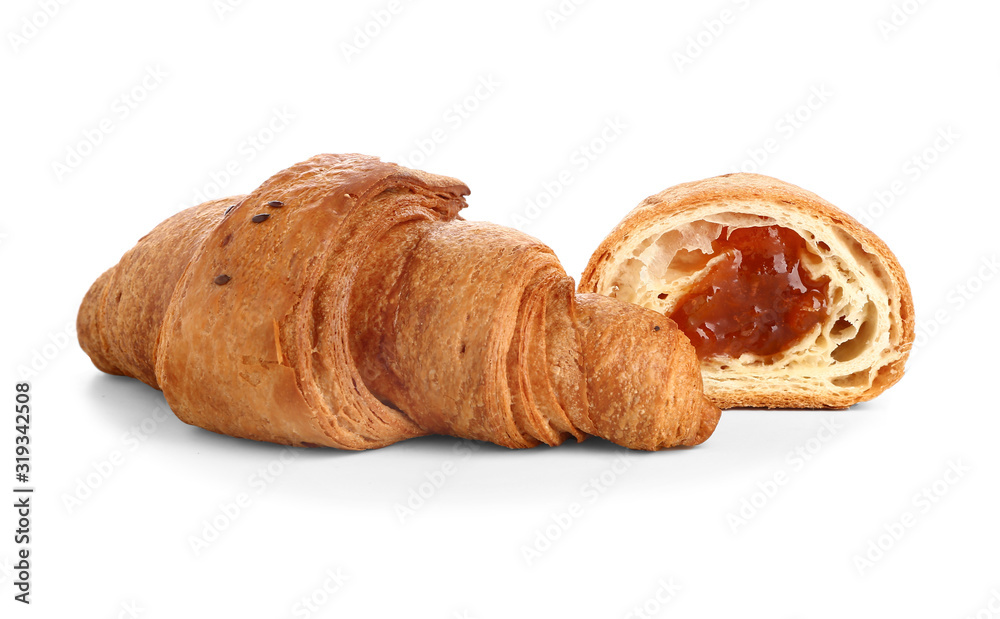 Tasty sweet croissants on white background