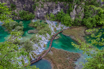 View from above of waterfall cascade with turquoise water in Plitvice Lakes National Park, Croatia