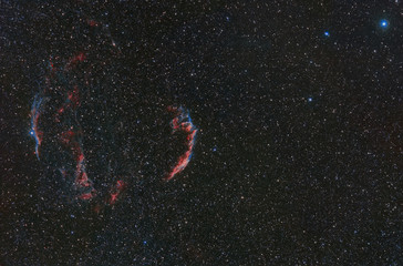 Poster - Photo of a cosmic nebula taken through a telescope. cosmic nebula NGC 6960. Space nebula between the stars. stars. space. cloud, dust, outer space.