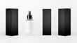 © finepoints - Mock up for design of packing cosmetics product - small transparent spray bottle, white label and black paper boxes of different sides on white background.