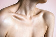 Neck shoulders and collarbones of a beautiful woman