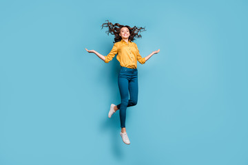 Sticker - Full length body size view of nice attractive carefree careless cheerful wavy-haired girl jumping having fun throwing hair isolated on bright vivid shine vibrant green blue turquoise color background