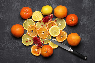 Wall Mural - Whole and sliced citrus fruits