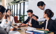 © Art_Photo - Group of professional business meeting and discussing strategy with new startup project.Creative business people planning and brainstorm with document report in modern workloft.Teamwork concept