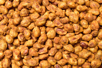 Canvas Print - top view of coated peanuts namkeen, coated peanut background