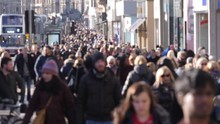 Anonymous / Unrecognisable People Walking On Princes Street, Edinburgh. They Are Shopping And Walking. Blurred. Slow Motion.