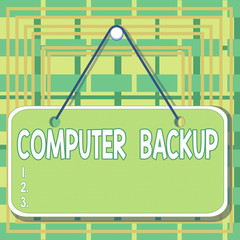 Text sign showing Computer Backup. Business photo text the act of copying of files and data onto a second medium Colored memo reminder empty board blank space attach background rectangle