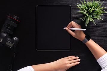 Aufkleber - designer using stylus pen on top view