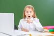 © Ermolaev Alexandr - Shocked girl points on screen of the laptop. Internet safety concept
