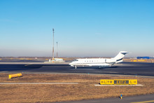 Mid Size Modern Vip Private Jet Running On Rairport Runway Ready To Departure. Pilot Asking Air Traffic Control Officer For Take-off Clearance. Luxury Small Corporate Business Aircraft Trip