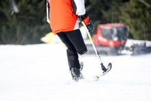 Resilient Amputee Skier Displaying Strength And Determination  Training On A Ski Resort