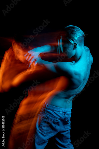 Cuadros en Lienzo back and spine portrait of young sports blonde dancer man