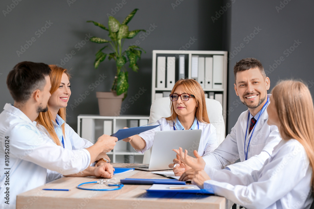 Team of doctors during meeting in clinic