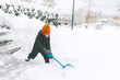 Little boy shoveling snow, Vancouver, Canada