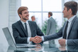 © ASDF - close up. handshake of business people at the Desk