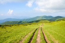Beautiful Landscape View Of Road In Green Mountains With Cloudy Sky, Carpathians, Ukraine,