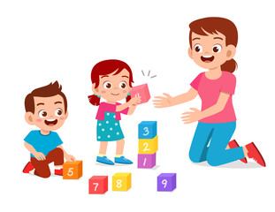 happy cute little kids boy and girl study with teacher