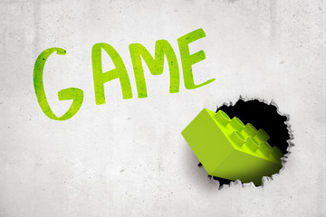 Fototapete - 3d rendering of concrete wall with title 'GAME' and bright greenbrick that has been thrown into wall and has broken hole in it.
