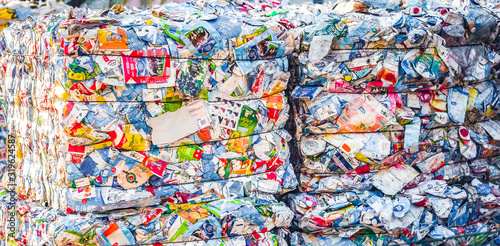 Recycling and storage of waste for further disposal, trash sorting. Picture of recycled plastic waste pressed to bales. Plastic bottles,compressed
