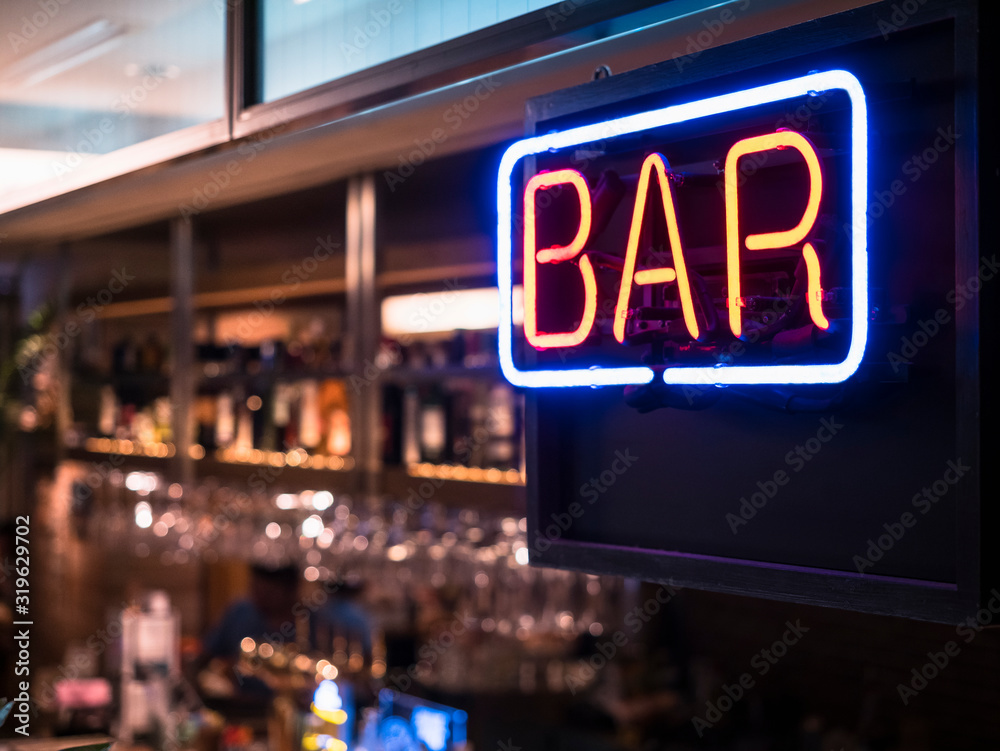 Bar Neon sign with Blur counter bar background - obrazy, fototapety, plakaty 