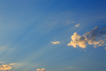 sun light shine through cloud on clear blue sky background