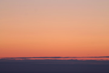 Wall Mural - a beautifully backlit colorful sunset sky with the colors of sunrise and sunset.