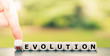 © Frank H. - Evolution instead of revolution. Hand turns a dice and changes the word 'revolution' to 'evolution'.