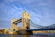 © Jonathan Wilson - Tower Bridge in the City of London, UK. Tower Bridge crosses the River Thames and is one of the most famous tourist sights in London. Wide angle view of Tower Bridge in late afternoon light.
