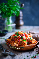 Canvas Print - Dominican rice with vegetables and sausages