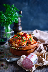 Canvas Print - Dominican rice with vegetables and sausages