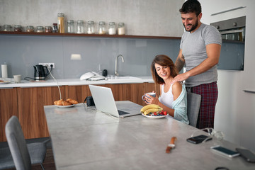 Wall Mural - Loving  boyfriend and his  girlfriend enjoying in  breakfast together. Love, Romance and valentine’s day concept.